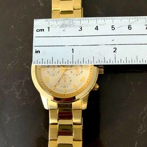 Ladies GUESS gold watch